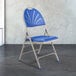 A gray metal National Public Seating folding chair with a blue plastic seat.