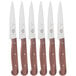 A group of Victorinox steak knives with rosewood handles.