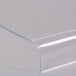 A clear plastic shield on a table.