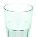 A green polycarbonate tumbler with a clear rim.