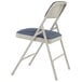 A National Public Seating gray metal folding chair with an Imperial blue fabric padded seat.