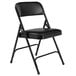 National Public Seating 1210 Black Metal Folding Chair with 1 1/4 inch Caviar Black Vinyl Padded Seat