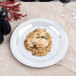 a plate of food on a marble surface