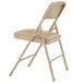 A beige National Public Seating metal folding chair with a French beige vinyl padded seat.