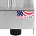 An Alto-Shaam heated carving station with a sneeze guard on a metal counter.