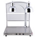 An Alto-Shaam stainless steel heated carving station with two silver lamps.