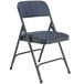 A National Public Seating blue metal folding chair with a blue cushion.