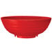 A red melamine bowl with a handle.