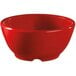 A red bowl with a handle.