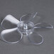 A clear plastic fan blade with a metal center.