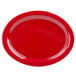A red oval platter with a speckled surface.