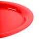 A red oval platter with a white background.