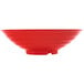 A red bowl on a white background.