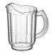 A clear plastic pitcher with a handle.