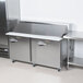 a large stainless steel commercial kitchen