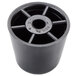 A black plastic cylinder with a round metal center and holes.