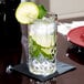 A Nachtmann Noblesse Longdrink glass of water with a lime wedge and a slice of lime