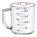 A clear Cambro measuring cup with red and blue measurements.