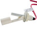 A white plastic liquid level switch with red wires.