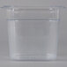 A Rubbermaid clear plastic food pan with a lid on it.