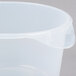 A Rubbermaid translucent round plastic food storage container with a lid.