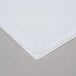 A white Rubbermaid polyethylene food storage container lid.