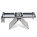 A metal frame and block assembly for a Nemco Easy Cheeser on a table.