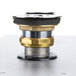 A Hatco FR-3 Food Rethermalizer with brass and gold accents on a metal table.