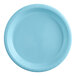 A close-up of a light blue plastic plate with a white circle.