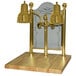 A brass Hanson Heat Lamp carving station on a wooden base with a maple block and sneeze guard.
