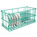 A green Microwire dish rack holding plates.