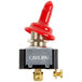A red and black Carling switch assembly with a red top.