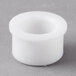 A white plastic Bar Maid upper bearing shaft.