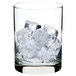 A glass of ice cubes in a Manitowoc ice dispenser.