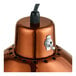 A Hanson Heat Lamps ceiling mount heat lamp with a smoked copper finish and black retractable cord.