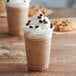A close-up of a Big Train Espresso Blended Ice Coffee with whipped cream and chocolate chips.