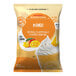 A white bag of Big Train Dragonfly Mango Blended Creme Frappe Mix with text and images.