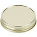 A gold metal Libbey Mason jar lid.