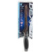 A Dexter-Russell V-Lo fillet knife in packaging with a black handle and black blade.