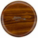 A close up of a Cambro Burma Teak fiberglass tray with white text on it.