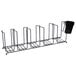 A black metal San Jamar cup and lid organizer rack with five horizontal cup holders.