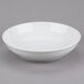 A white Tuxton pasta/serving bowl.