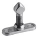 A silver metal Kason door strike with a nut on a stainless steel screw.
