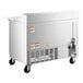 A stainless steel refrigerated sandwich prep table with two doors, a raised cutting top, and casters for mobility.