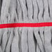 A close up of a red and gray striped Unger SmartColor tube mop head.