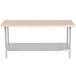 An Advance Tabco wood top work table with a stainless steel base and undershelf.