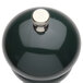 A Chef Specialties forest green salt mill with a silver top.