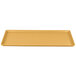 A rectangular Cambro dietary tray with a yellow surface and tan rim.