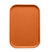 A rectangular orange Cambro tray insert.