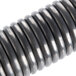 A metal door spring coil.